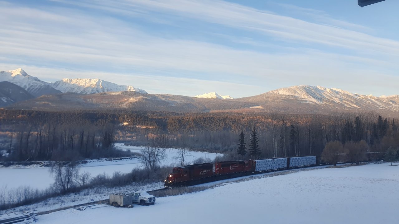 Canadian Pacific train on the Kooteney line on the banks of the Columbia River.